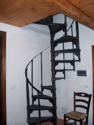Spiral staircase leading to mezzanine