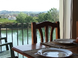 Dining room also looks over the river