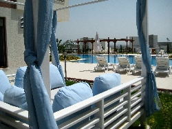 Relax in the Cabana by the pool