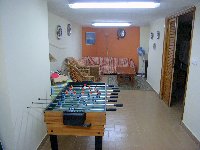 basement playroom with TV and dvd player