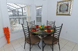 Small round table over looking the pool