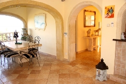 Hallway leading to elegant dining area