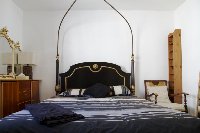 Master bedroom with fourposter bed