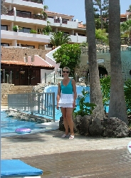 By the pool and a very tall elephant