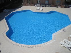 view of pool from balcony