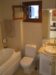 Marble bathroom with jacuzzi bath