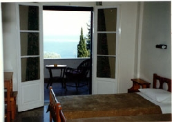 a bedroom mith seaview.