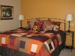 King ensuite, fireplace, TV, patio doors