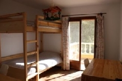 Bedroom with bunk beds and writing desks