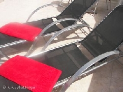 Sun loungers on terrace