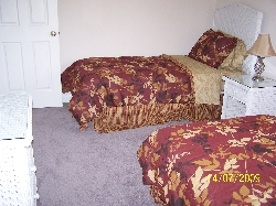 One of the twin rooms