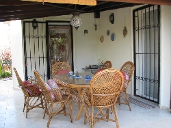 Main Sun terrace + cane table + chairs