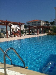 The large pool with lovely sun bed areas