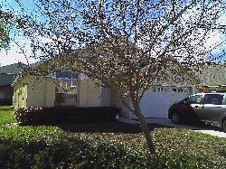 Front of villa with double garage