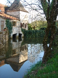 Main house exterior and millpond