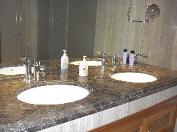 Marble-top bathroom with twin-basins