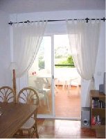 Looking from Dining area to balcony