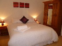 Bedroom 4 with ensuite + harbour views