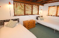One of the twin bedrooms