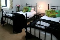 Twin bedroom in Poppy Barn (see website)