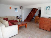 Living room and stairs to first floor