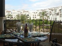 Balcony overlooking communal pool