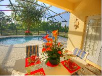 View of the pool from lanai, doors to mb