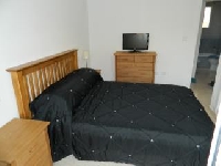 double bedroom with tv & dvd