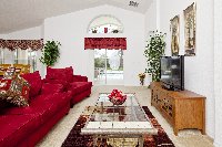 Lounge with patio doors to pool