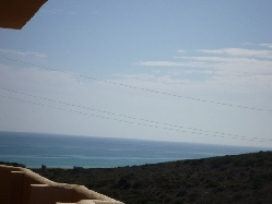 veranda with sea & hill views