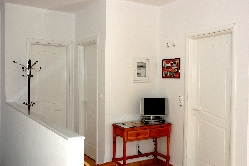 Interior doors to shower and bedrooms.