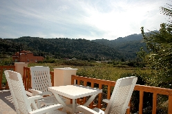 Balcony view to countryside/mountains.