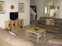 lounge with 3 comfy sofas