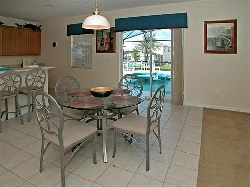 Fully equipped Kitchen with bar & table