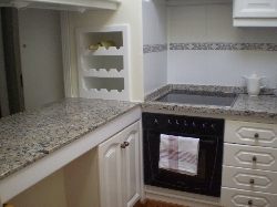Oven + hob in kitchen