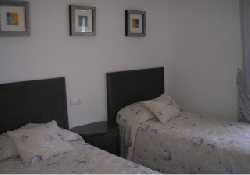 Second bedroom leading to sun terrace