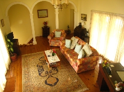 Spacious living room with satellite TV