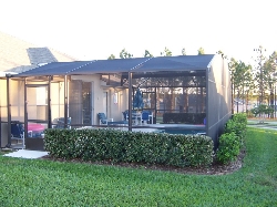Rear view of property and pool