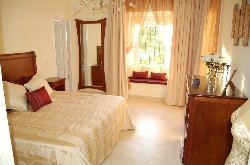 Bedroom 1  with window seat and terrace