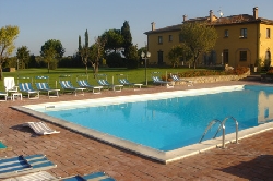 the pool with sun-beds