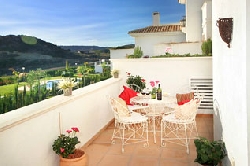 Sunny balcony overlooking sea & mountain