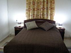 Master Bedroom with bed and ensuite