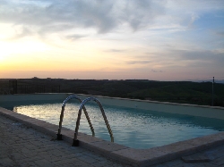 swimming pool at sunset