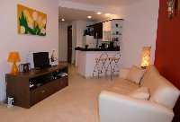 Livingroom with view to the terrace