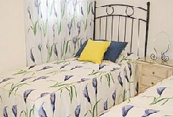 Large twin bedroom - lots of storage