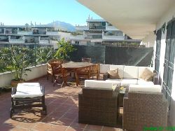 Large balcony with furniture