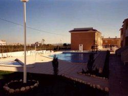 Shared pool view across farmland to rear