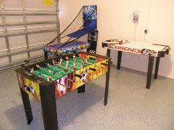 Games area with foosball, multigame tabl