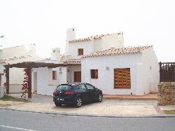Front of villa with parking