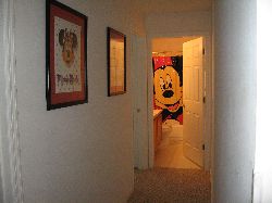 Hallway leading to 3rd bathroom